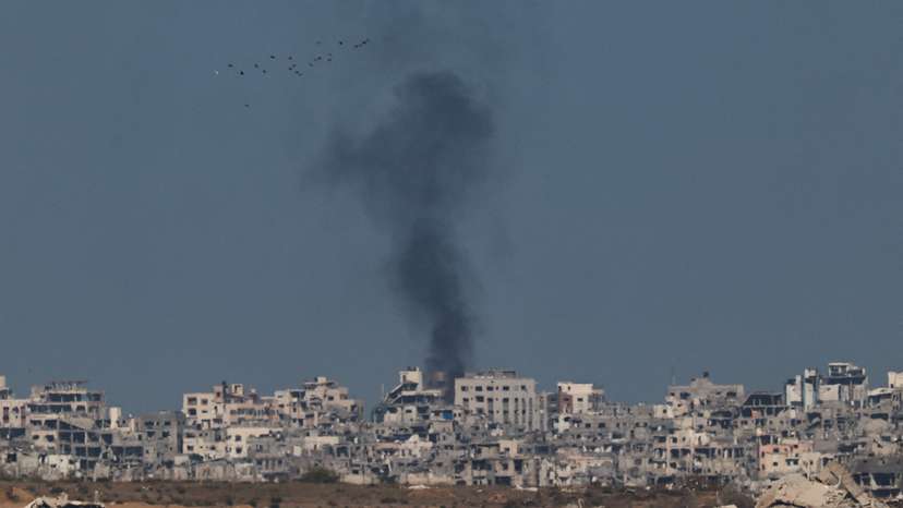 Smoke rises from Gaza as seen from the Israeli side of the border