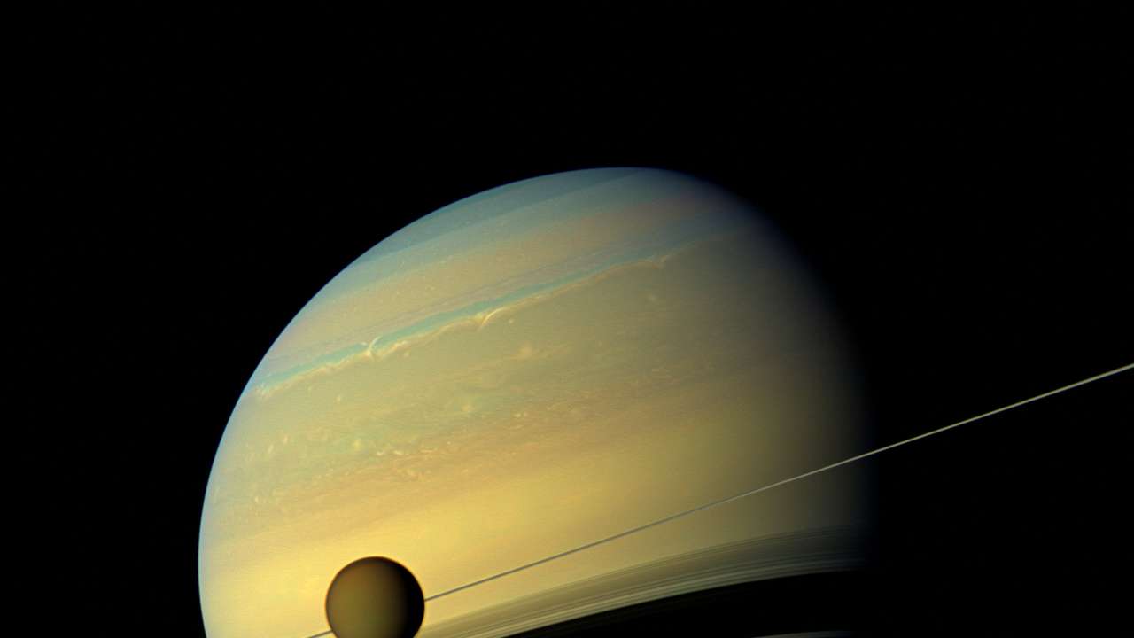 FILE PHOTO: Handout of Titan, Saturn's largest moon in this natural color view from NASA's Cassini spacecraft