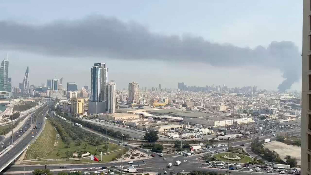 Smoke rises after the state news agency reported missile attack on the service center of the U.S. Fifth Fleet, in Manama