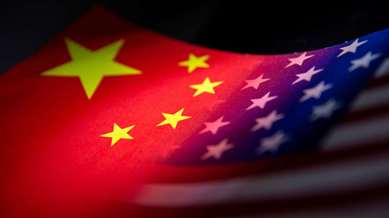 Illustration shows China's and U.S.' flags