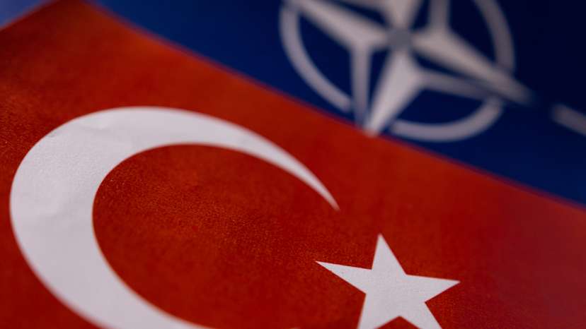 Illustration shows NATO and Turkish flags