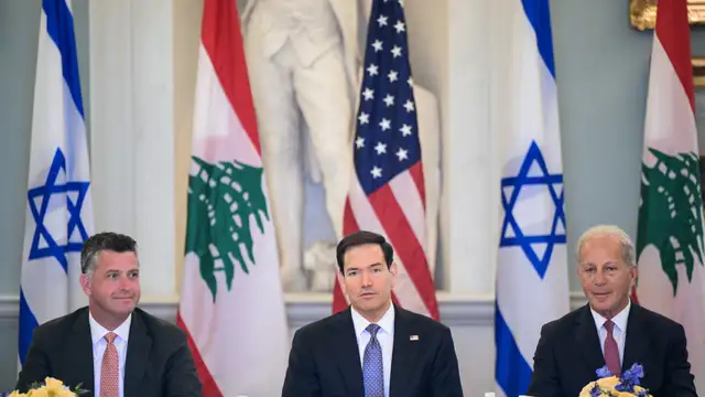 US Secretary of State Marco Rubio (C), alongside US State Department Counselor Michael Needham (L) and US Ambassador to Lebanon Michel Issa (R), speaks during a meeting with Lebanon's Ambassador to the US Nada Hamadeh Moawad (out of frame) and Israeli Ambassador to the US Yechiel Leiter (out of frame) at the State Department in Washington, DC, on April 14, 2026. (Photo by Oliver Contreras / AFP)