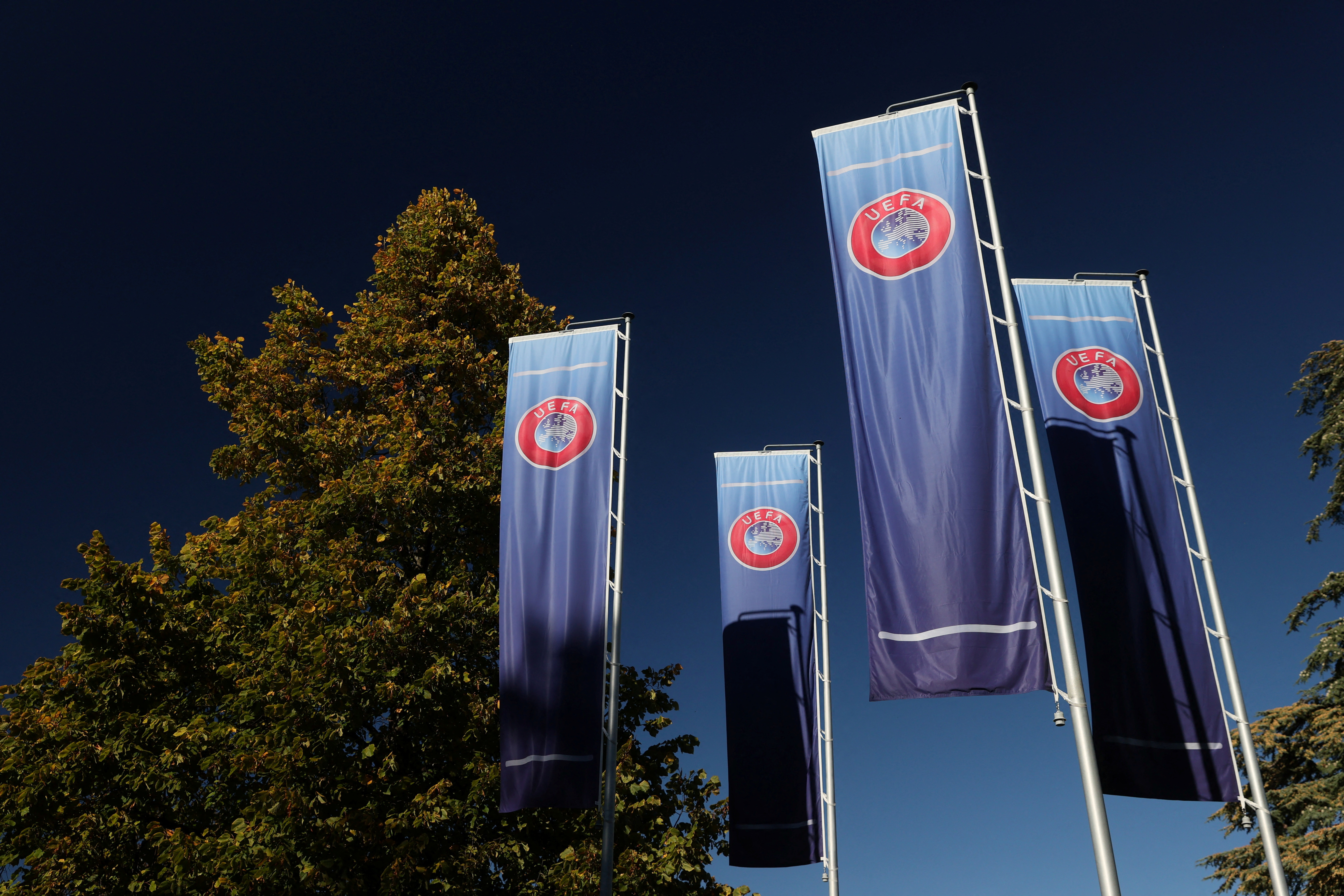 Flags with UEFA logo are seen in Nyon