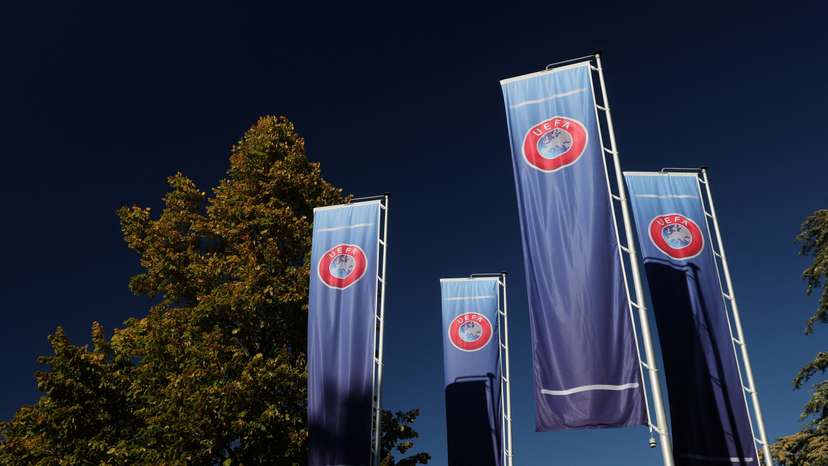 Flags with UEFA logo are seen in Nyon