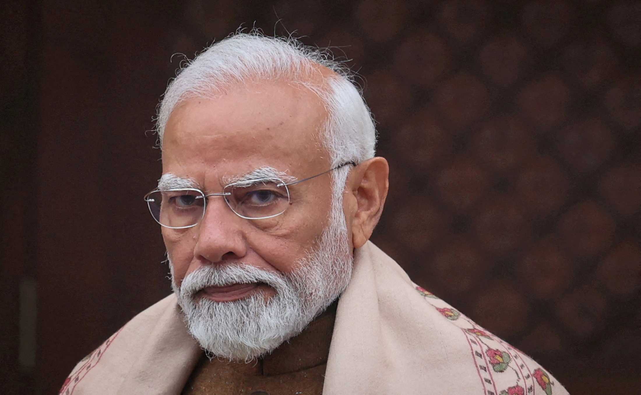 FILE PHOTO: India's PM Modi looks on after speaking with media inside parliament premises, in New Delhi