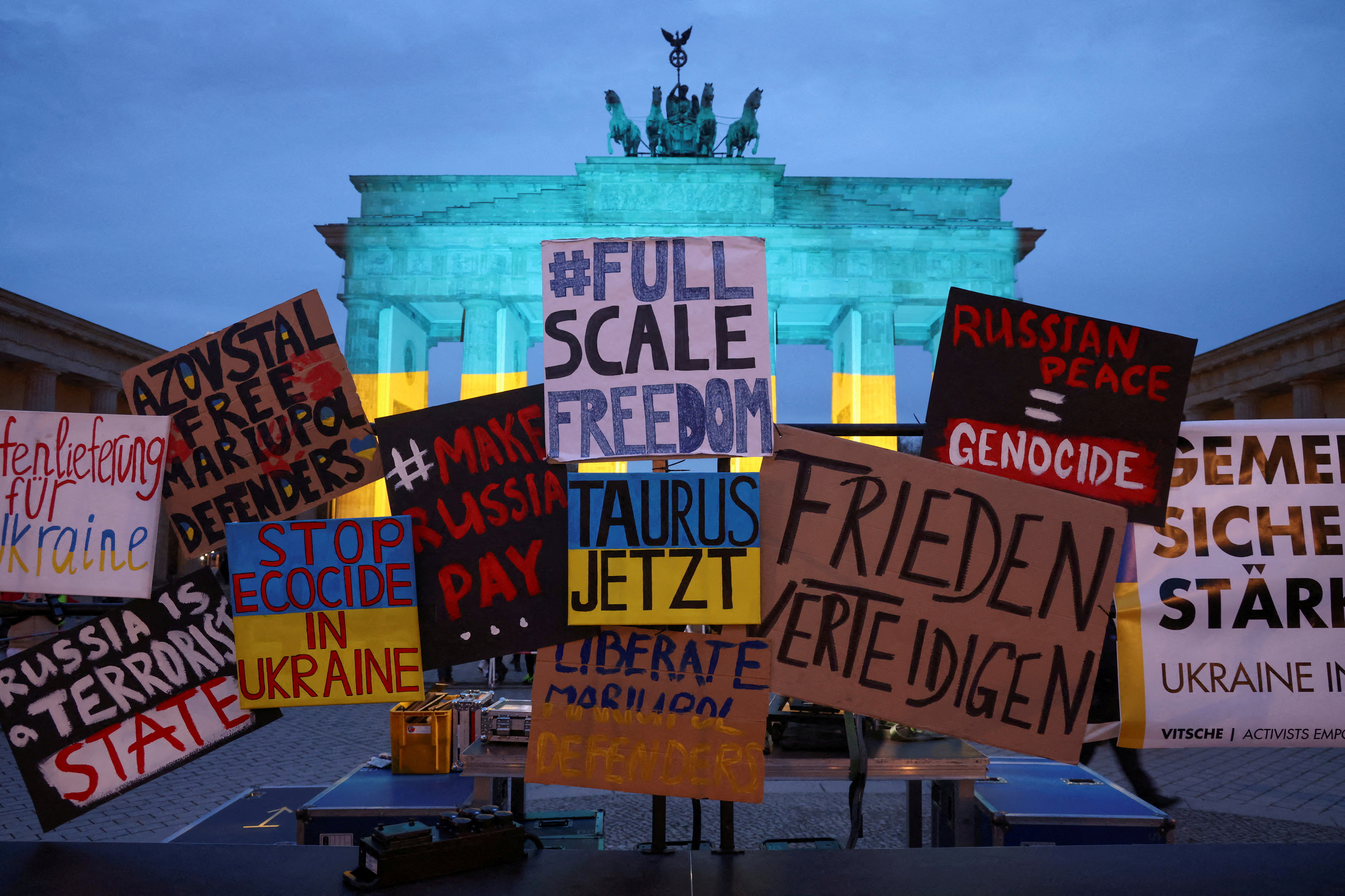 FILE PHOTO: The Brandenburg Gate in Berlin is illuminated with an Ukrainian flag, in Berlin