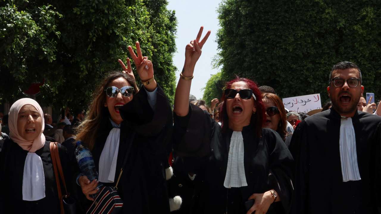Lawyers gesture during a one-day nationwide strike in Tunis