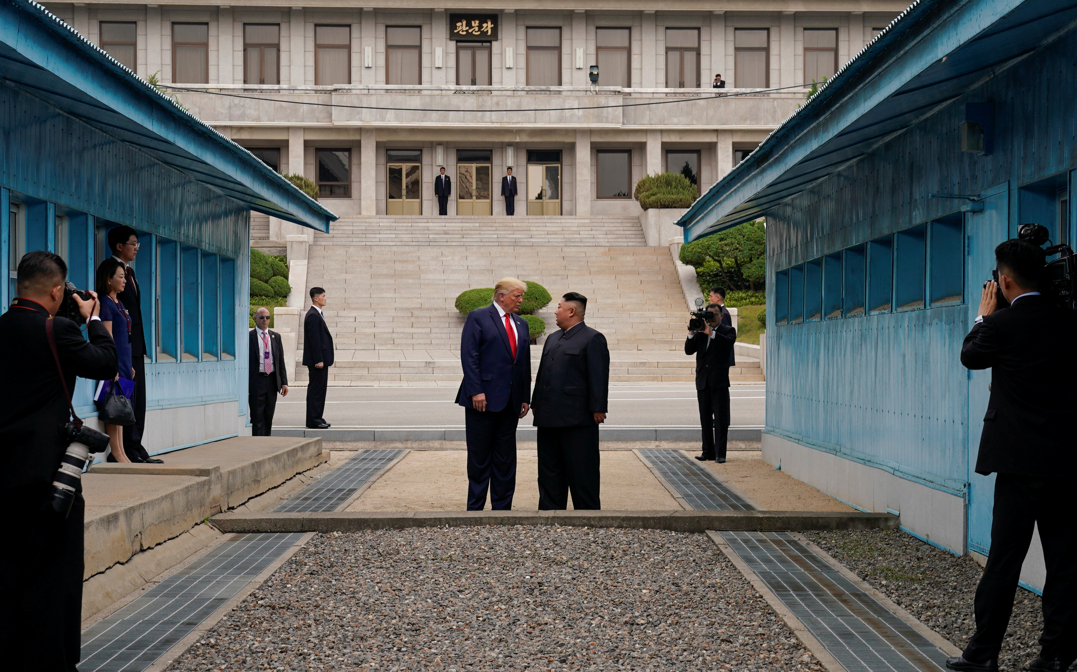Trump meets with North Korean leader Kim Jong Un at the DMZ on the border of North and South Korea