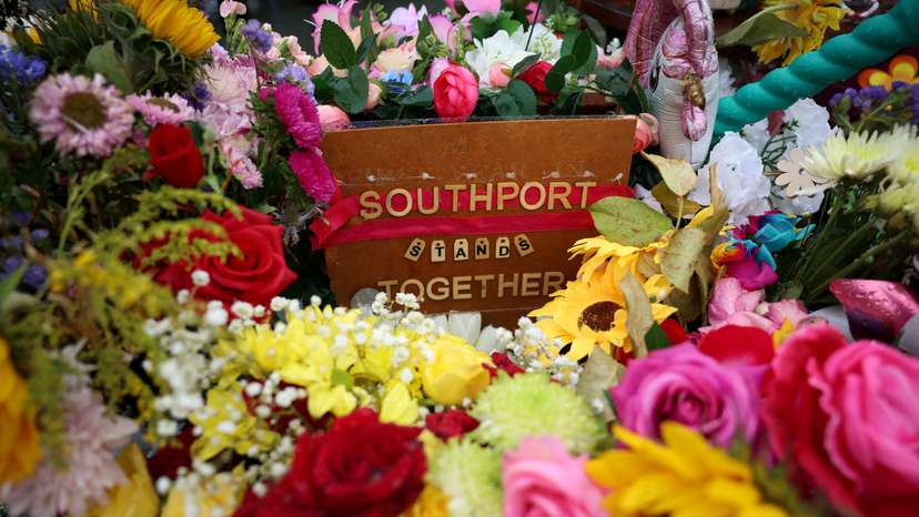 FILE PHOTO: Floral tributes left by members of the public are seen following the fatal knife attack on three young girls in July in Southport