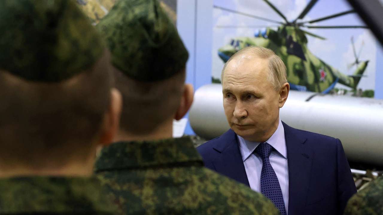 Russian President Vladimir Putin meets with military pilots in Torzhok