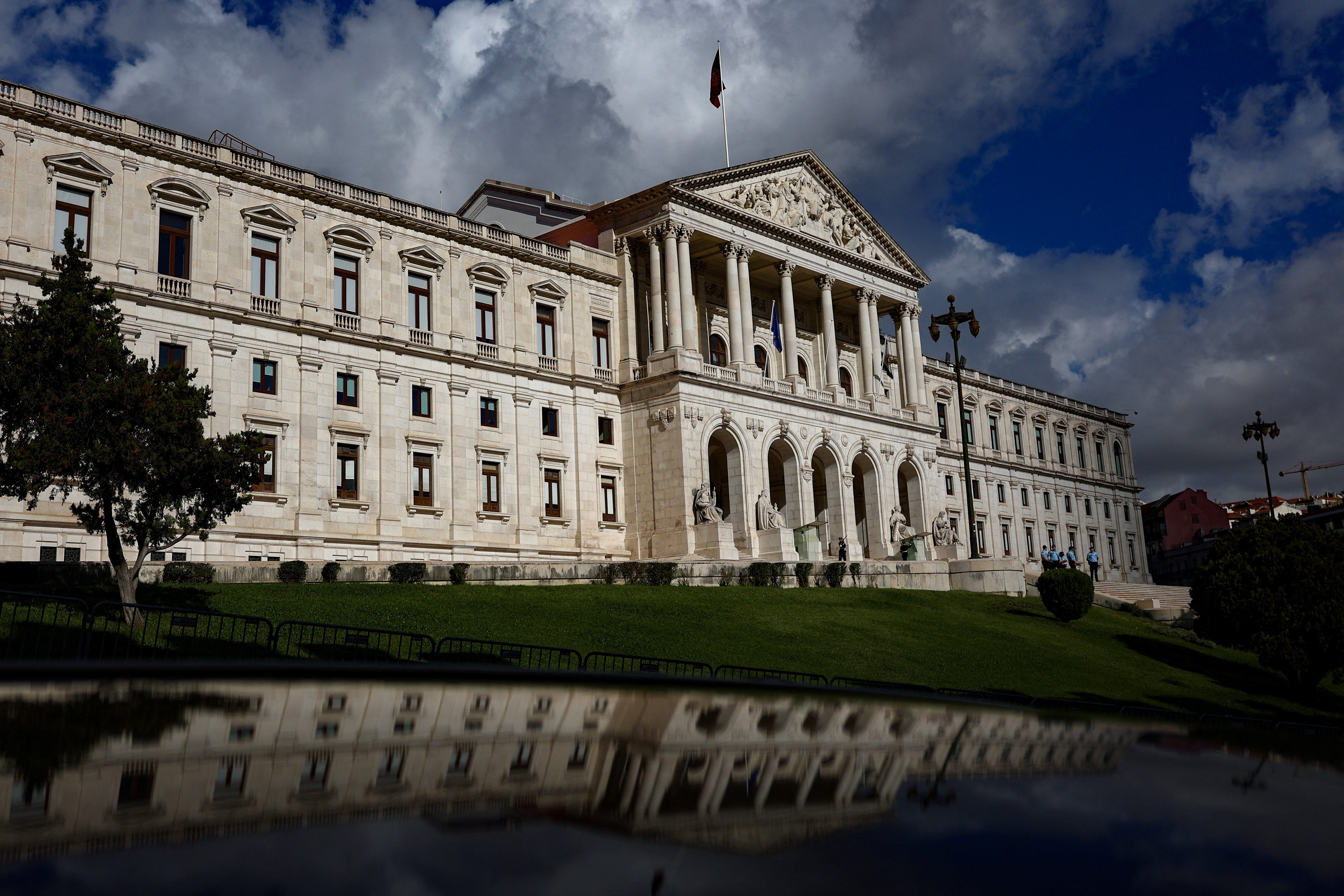 View of the Portuguese parliament and its reflection on the day Portugal's Finance Minister Joaquim Miranda Sarmento is expected to submit the 2025 budget draft to parliament, in Lisbon