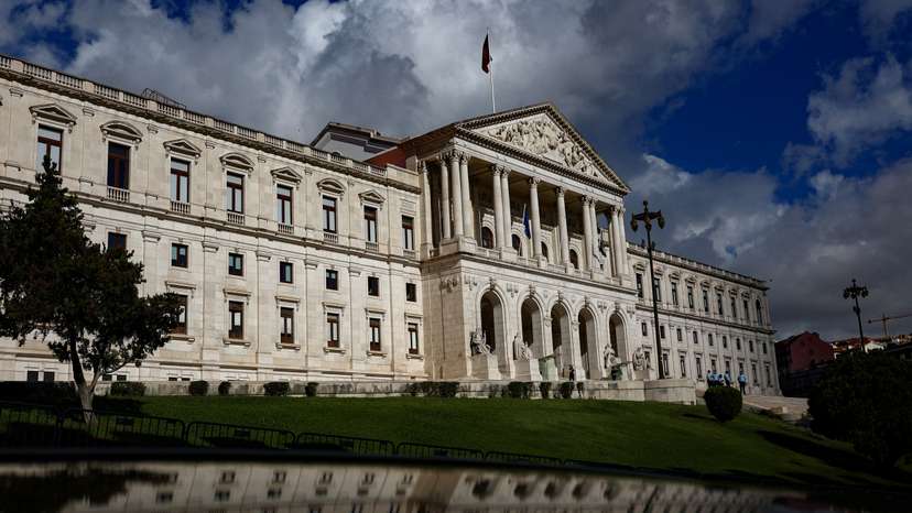 View of the Portuguese parliament and its reflection on the day Portugal's Finance Minister Joaquim Miranda Sarmento is expected to submit the 2025 budget draft to parliament, in Lisbon