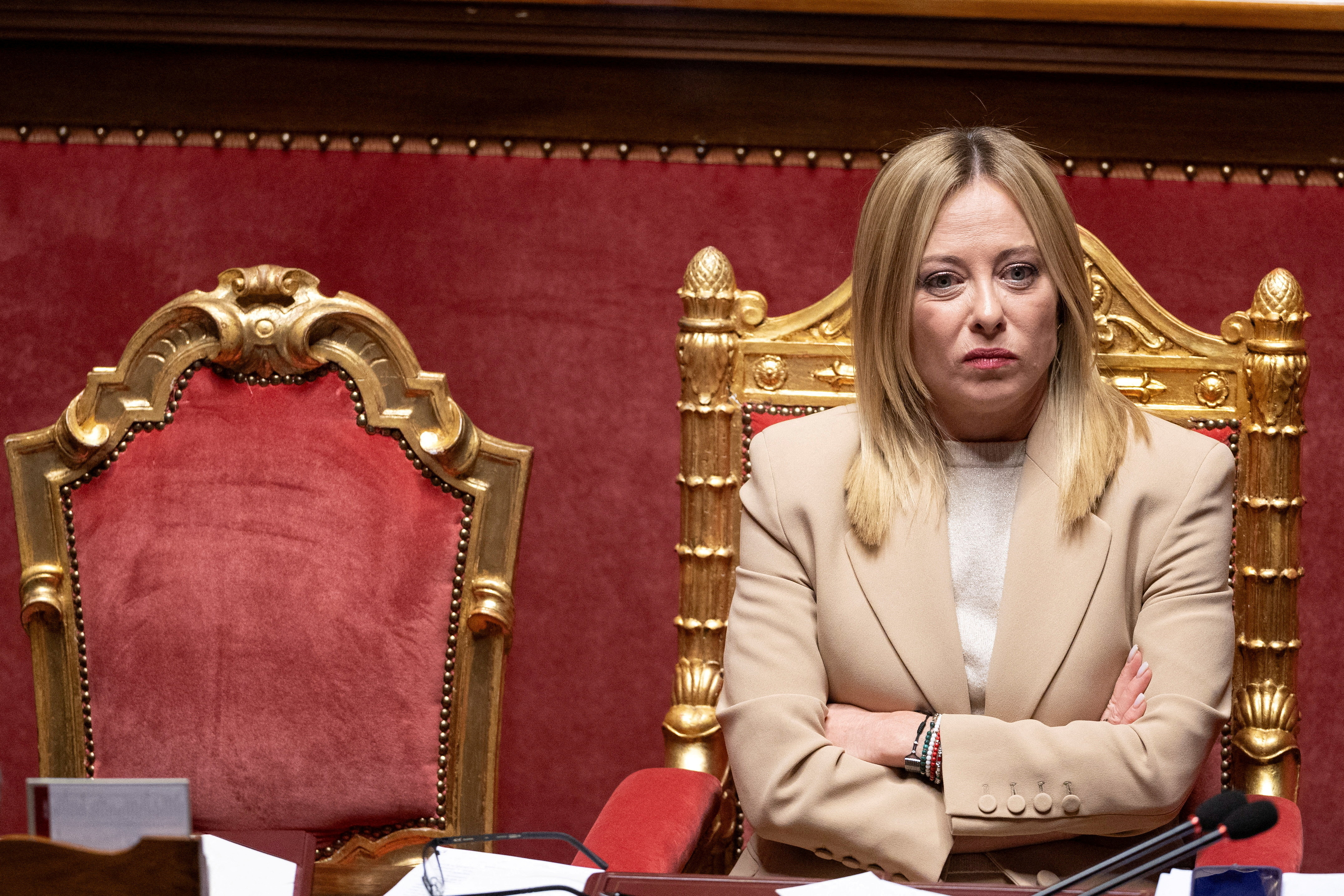 FILE PHOTO: Italy's P M Giorgia Meloni addresses the upper house of the Parliament in Rome, ahead of a European Council in Brussels