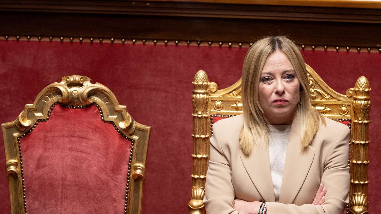 FILE PHOTO: Italy's P M Giorgia Meloni addresses the upper house of the Parliament in Rome, ahead of a European Council in Brussels