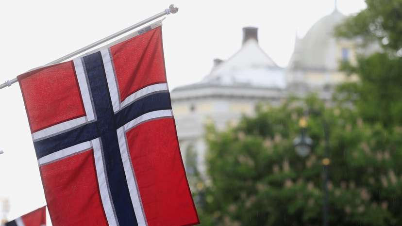 Norwegian flags flutter at Karl Johans street in Oslo