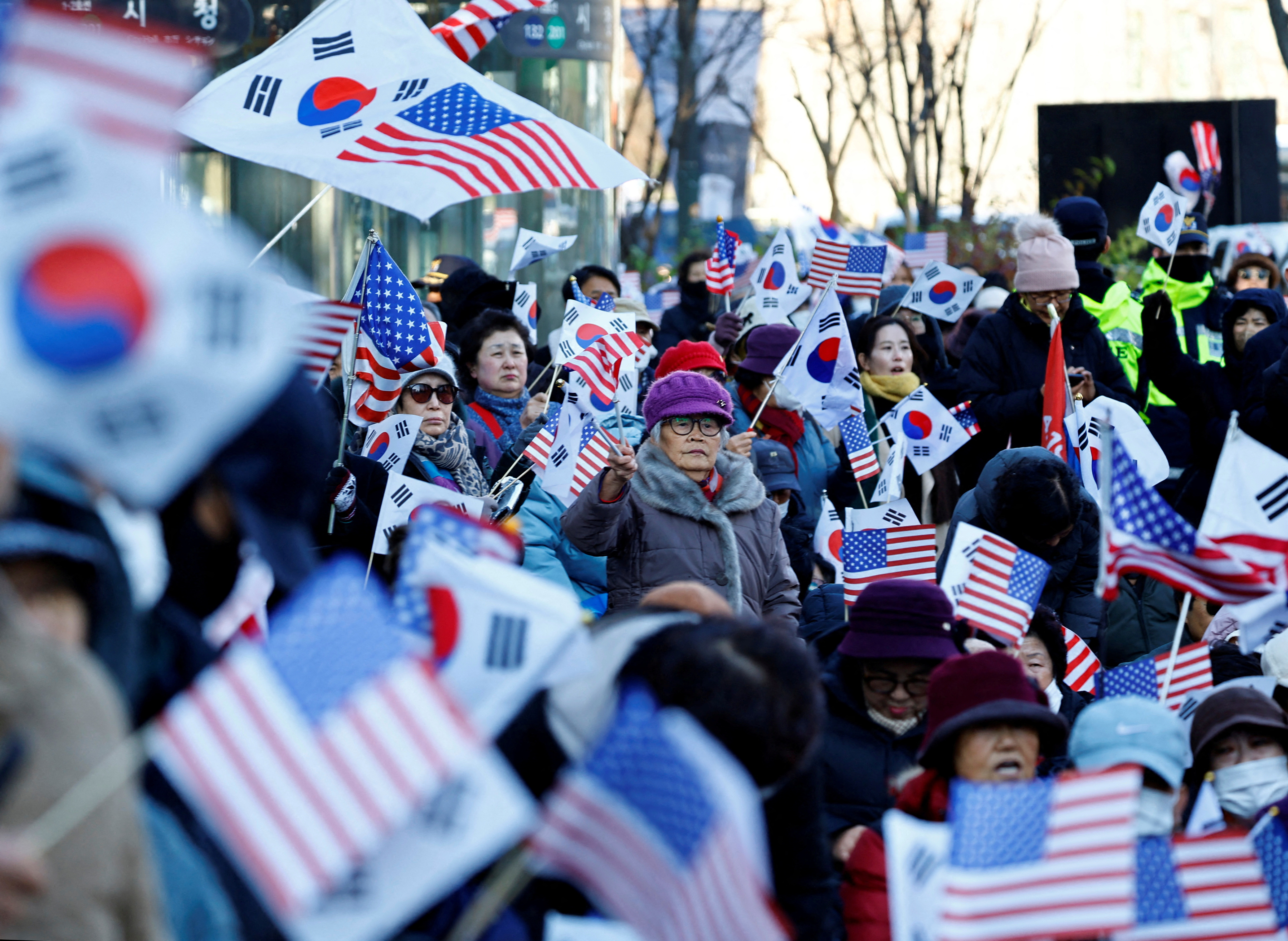 Protesters from conservative groups attend a rally supporting South Korean President Yoon Suk Yeol after the President's surprise declaration of the martial law last night, which was reversed hours later in Seoul