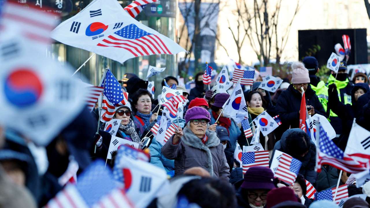Protesters from conservative groups attend a rally supporting South Korean President Yoon Suk Yeol after the President's surprise declaration of the martial law last night, which was reversed hours later in Seoul