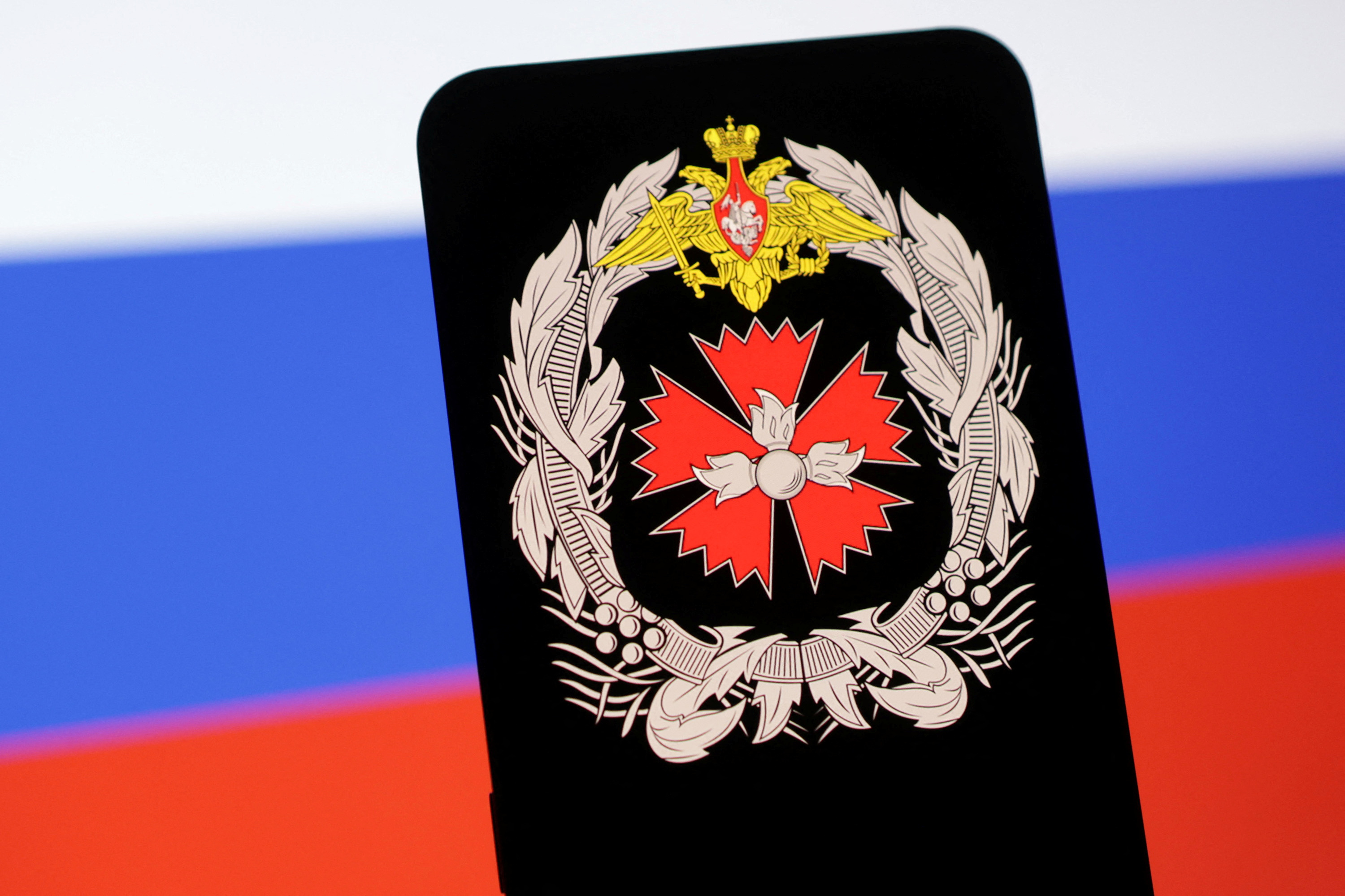 Illustration shows GRU logo and Russian flag