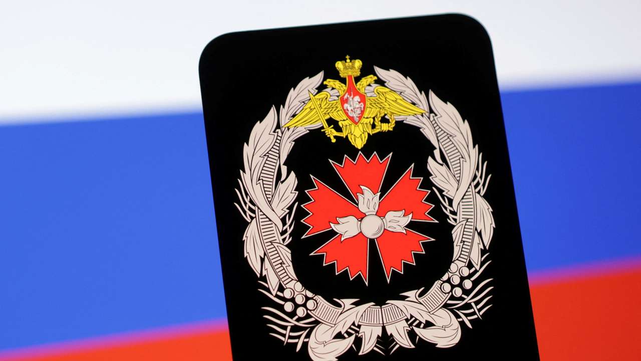 Illustration shows GRU logo and Russian flag