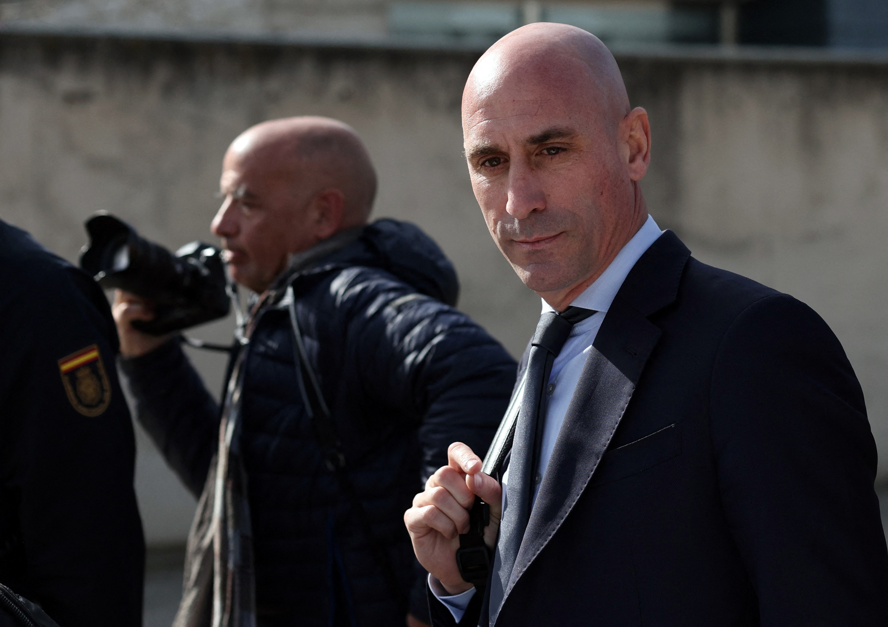 Luis Rubiales faces examination during trial