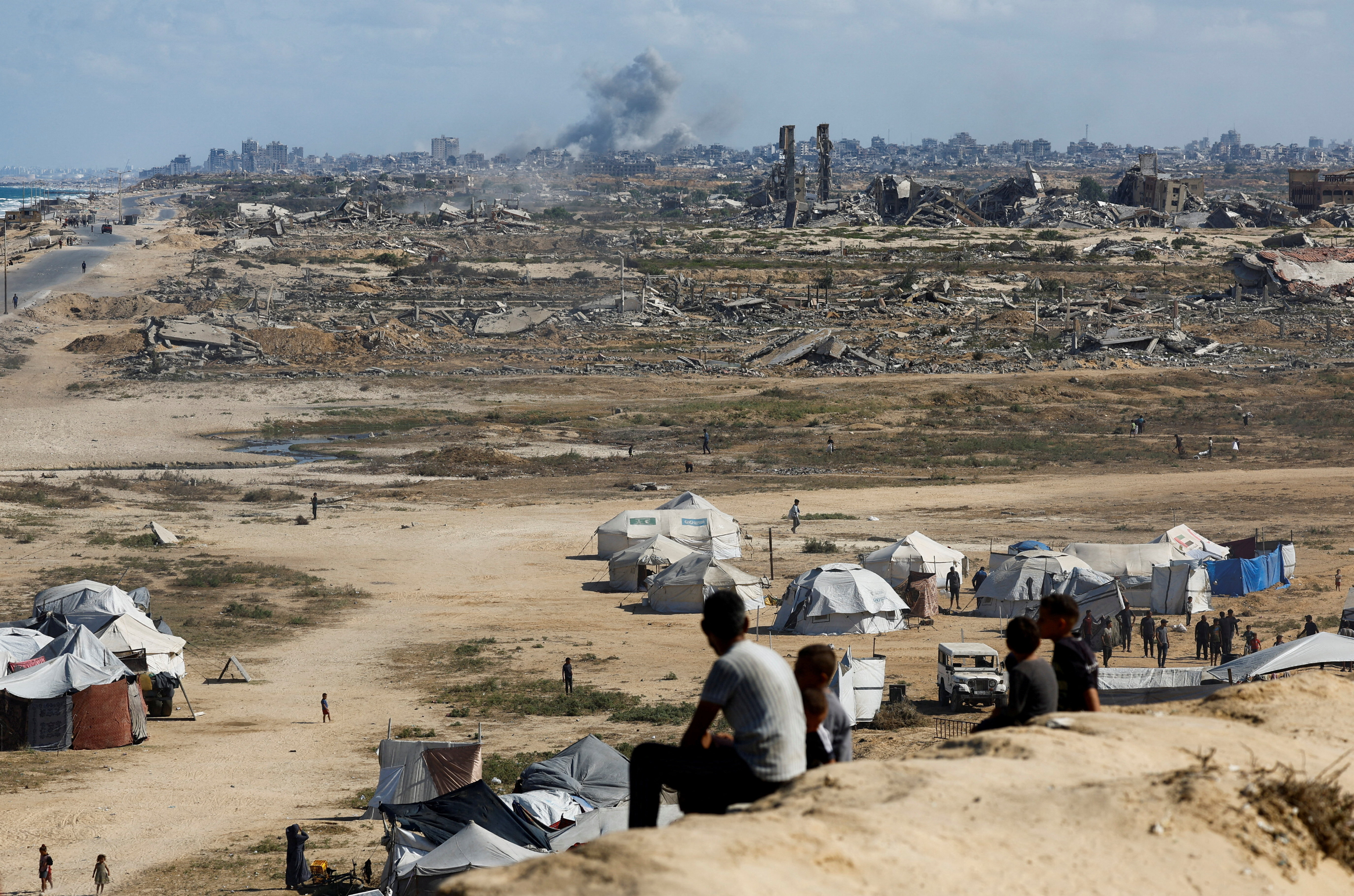 Smoke rises following explosions in Gaza City, as seen from central Gaza Strip