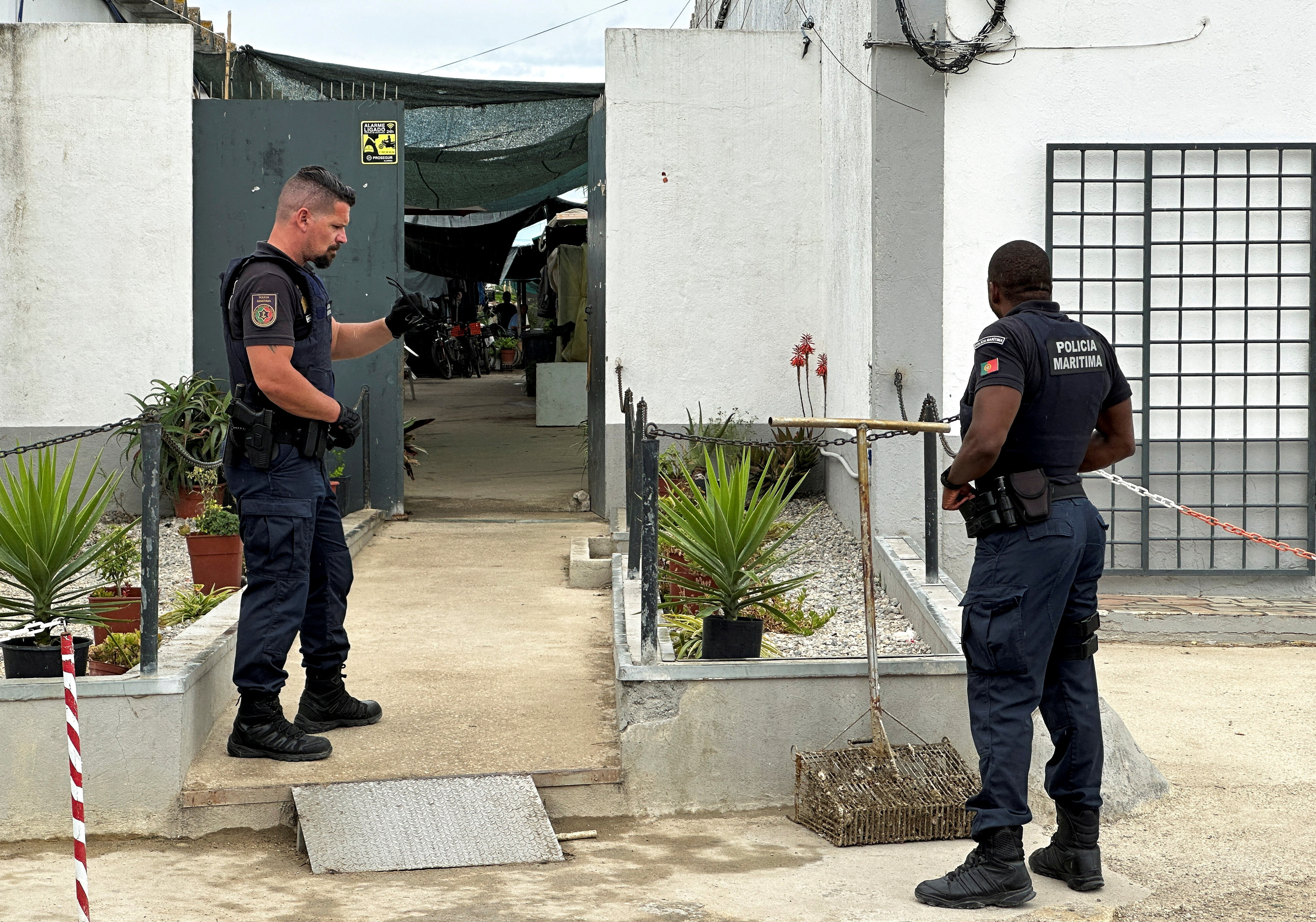 FILE PHOTO: Hundreds of human trafficking victims found in Portuguese warehouse near Lisbon