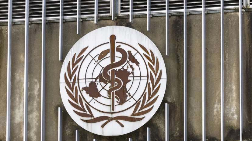 A logo is pictured at the WHO in Geneva