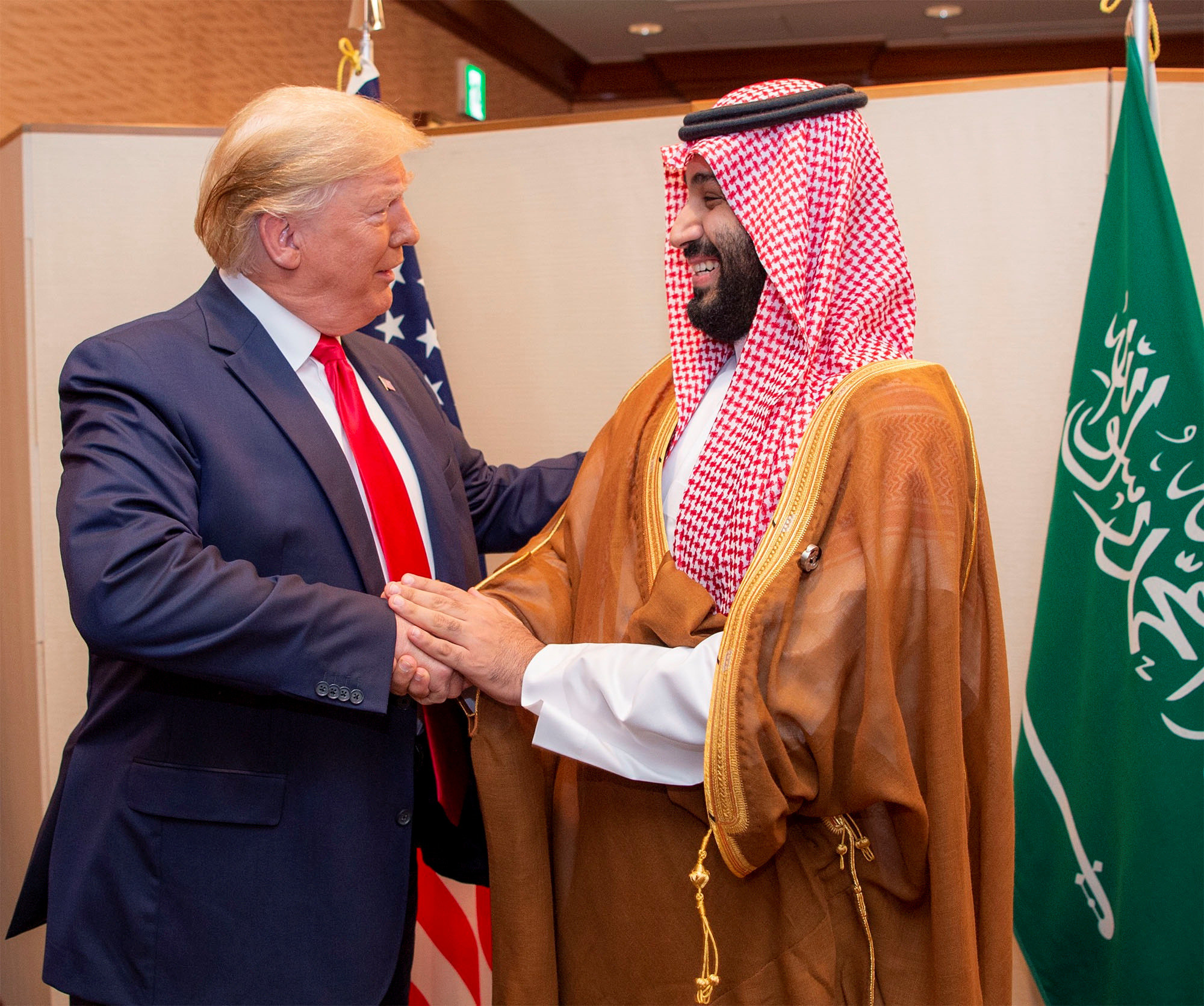 Saudi Arabia's Crown Prince Mohammed bin Salman shakes hands with U.S. President Donald Trump, at the G20 leaders summit in Osaka