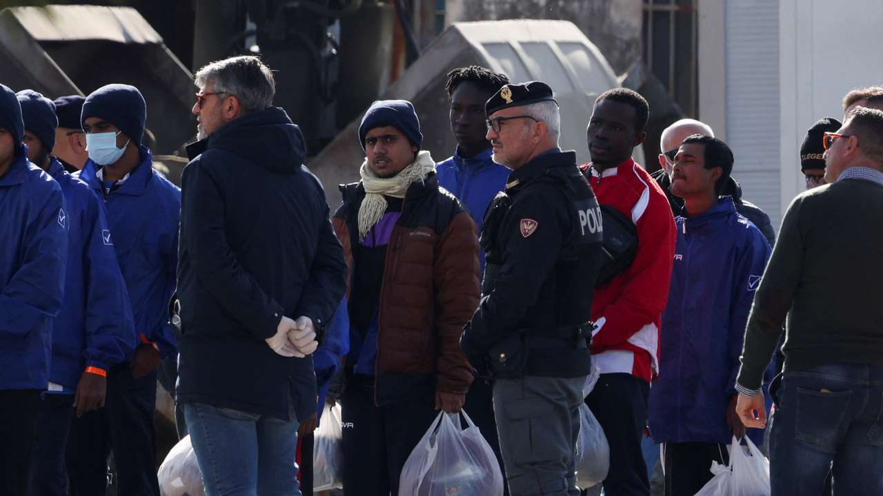 Migrants arrive in Albania as part of a deal with Italy to process thousands of asylum-seekers caught near Italian waters in Shengjin