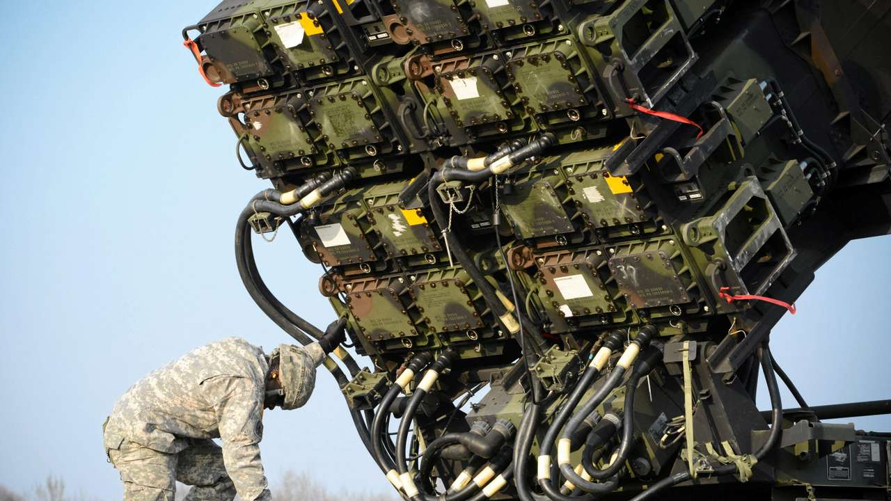 FILE PHOTO: A U.S soldier inspecys a Patriot missile defence battery during join exercises at the military grouds in Sochaczew