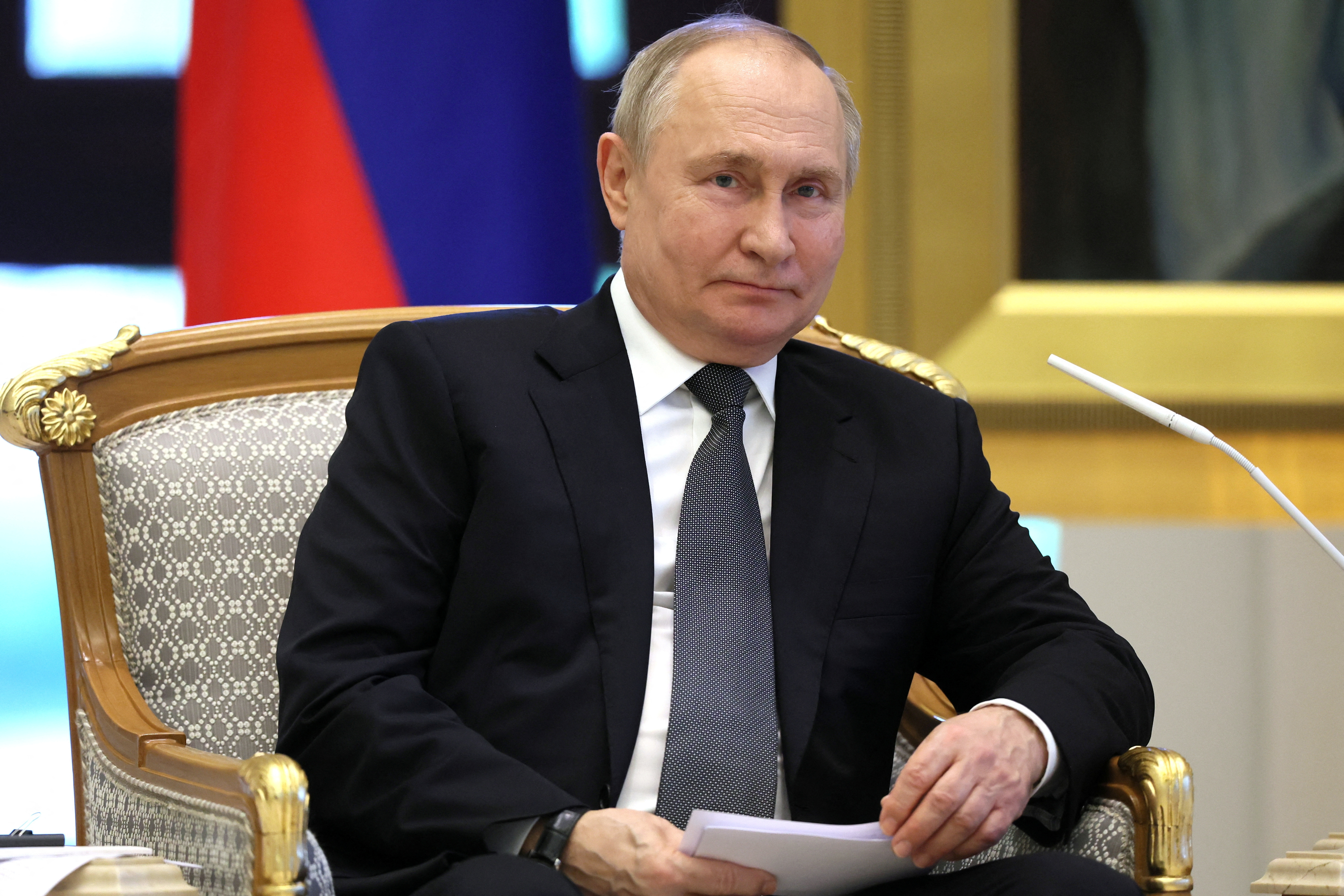 Russian President Vladimir Putin attends a meeting with President of the United Arab Emirates Sheikh Mohamed bin Zayed Al Nahyan in Abu Dhabi
