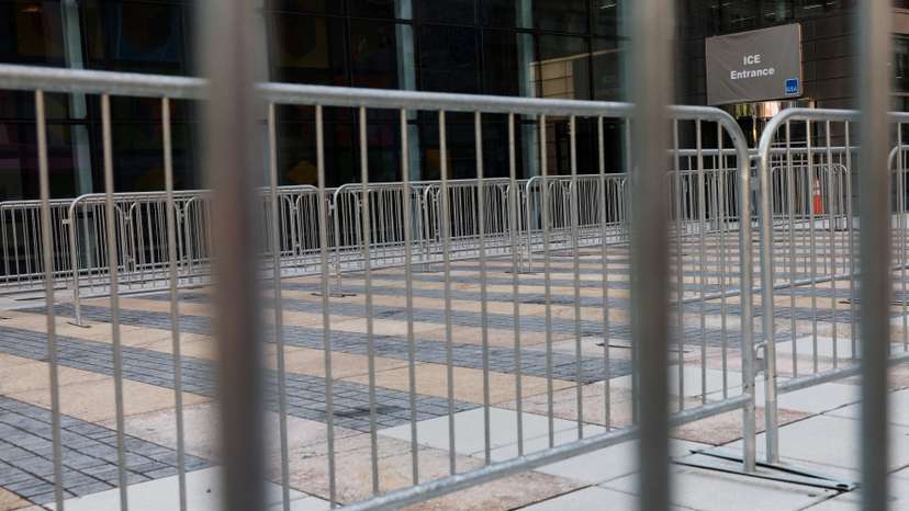 The entrance to the U.S. Immigration and Customs Enforcement (ICE) office stands behind fences outside 26 Federal Plaza in New York City