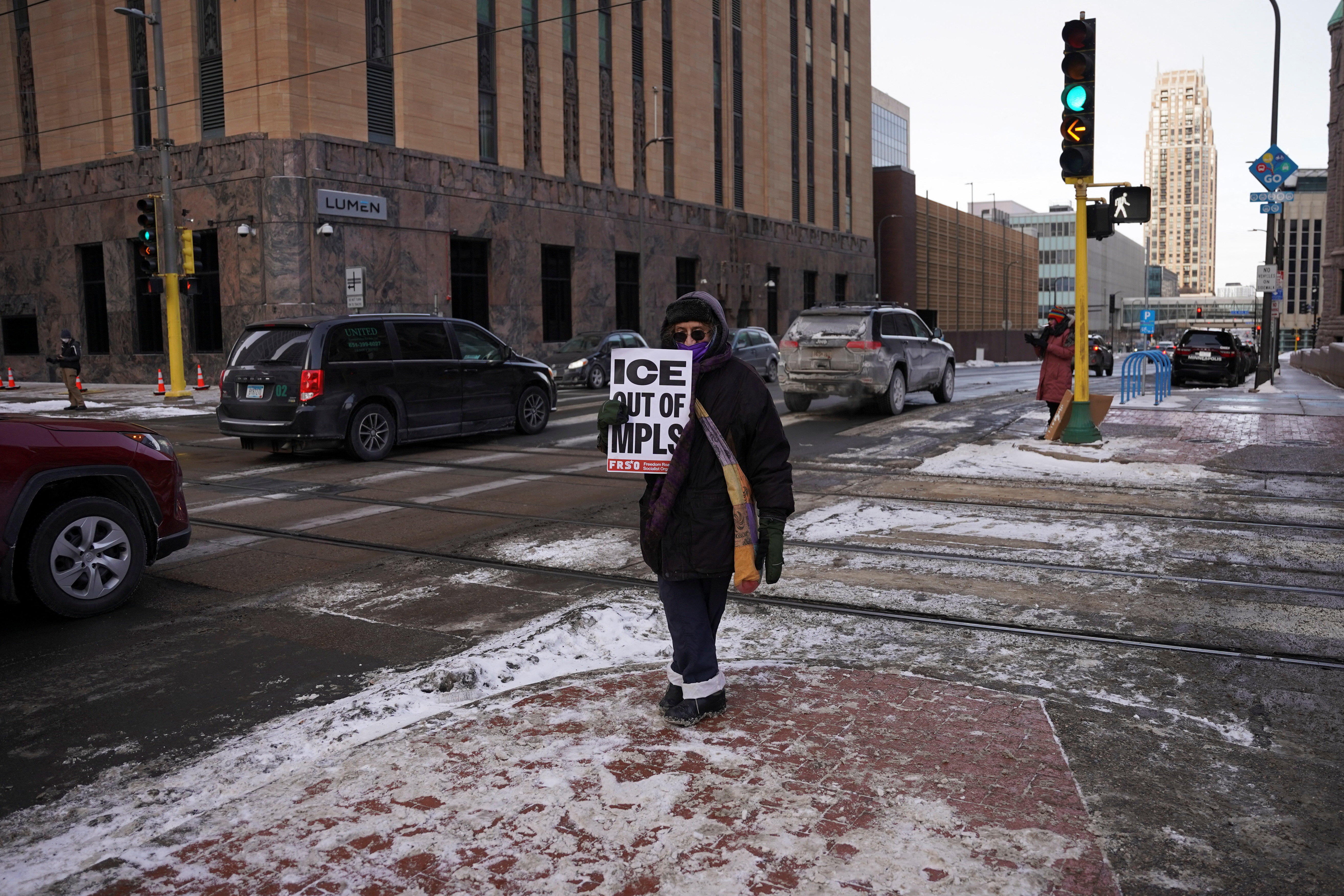 Demonstrators take part in a anti-ICE protest in Minneapolis