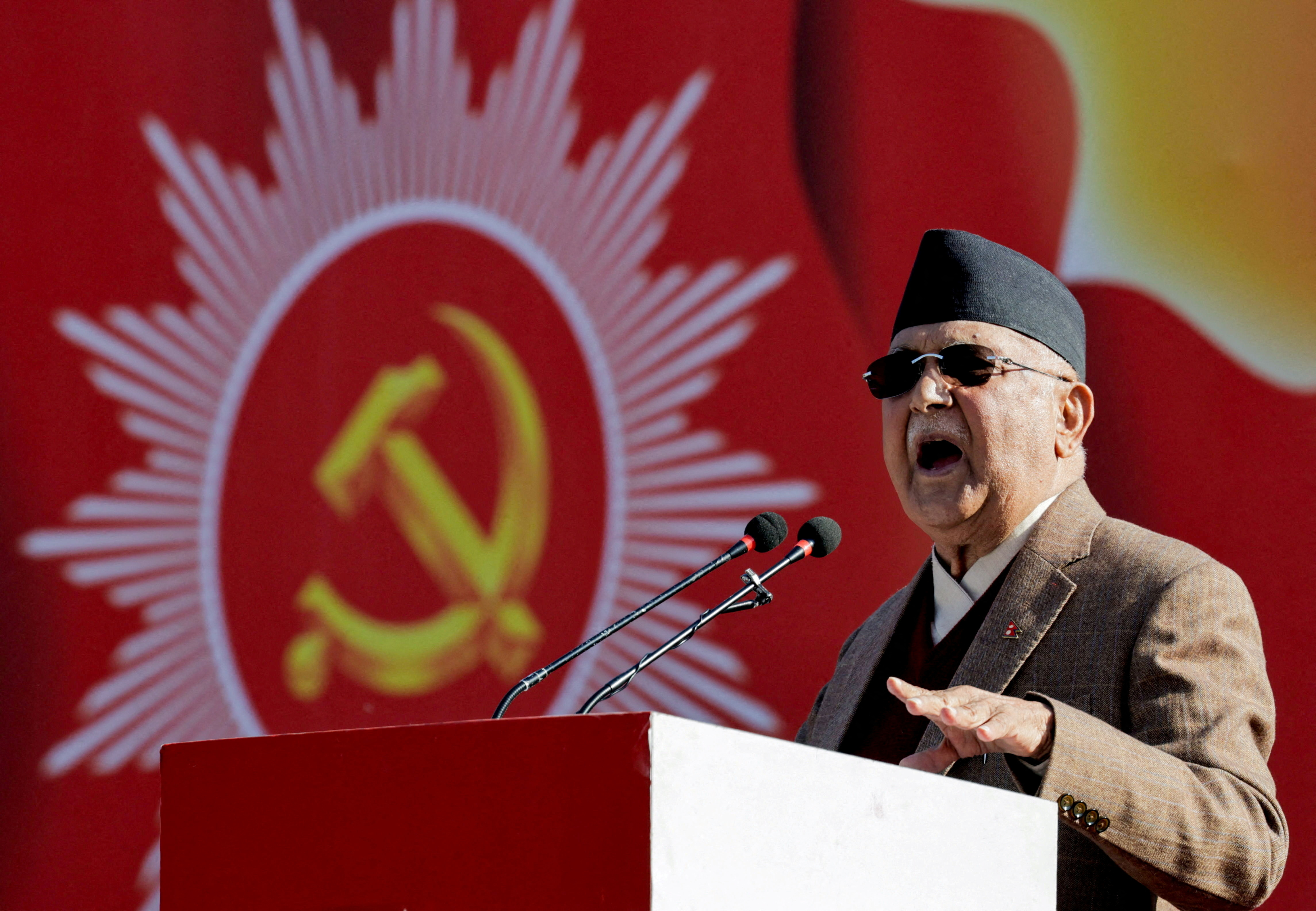 FILE PHOTO: Former Prime Minister of Nepal K.P Sharma Oli addresses his party during a rally in Kathmandu