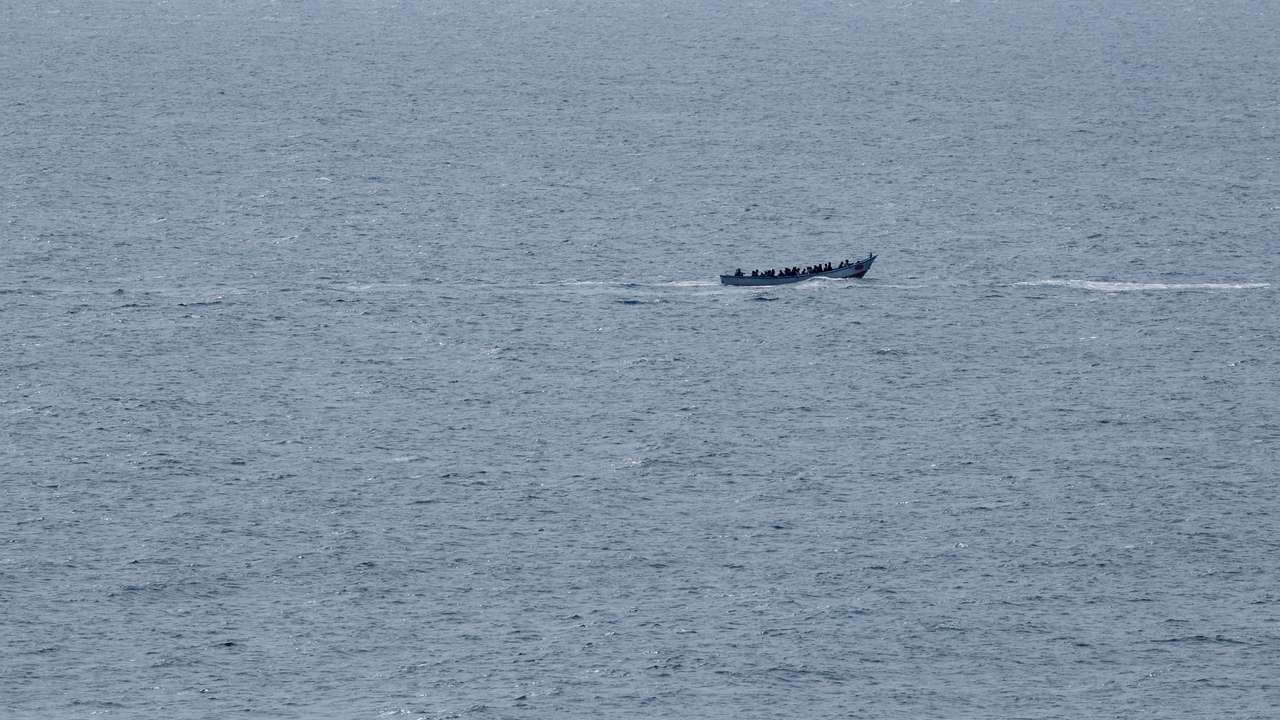 A boat with migrants sails south of the island of Gran Canaria