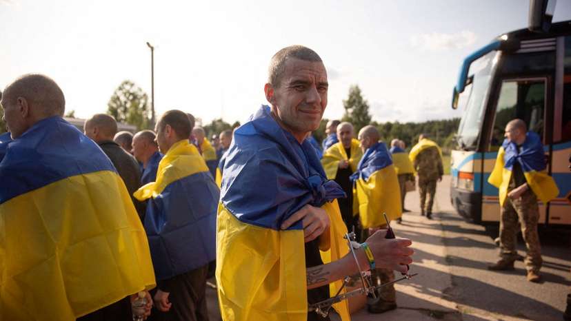 Ukrainian POWs are seen after a swap at an unknown location in Ukraine