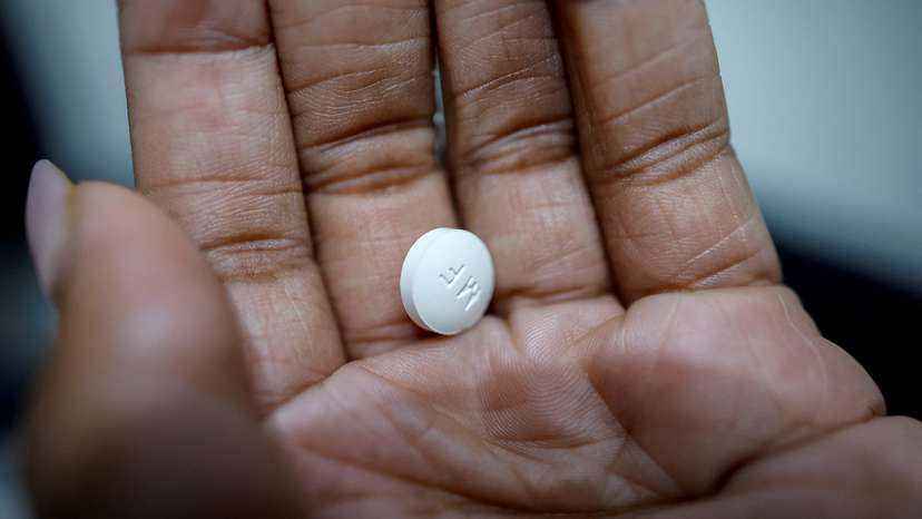 FILE PHOTO: A patient prepares to take Mifepristone, the first medication in a medical abortion, at Alamo Women's Clinic in Carbondale