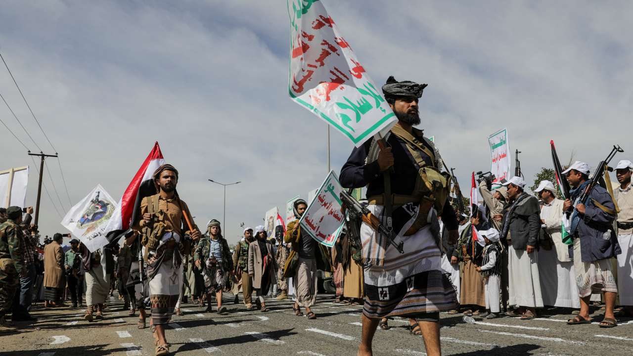 Houthi followers parade, in Sanaa
