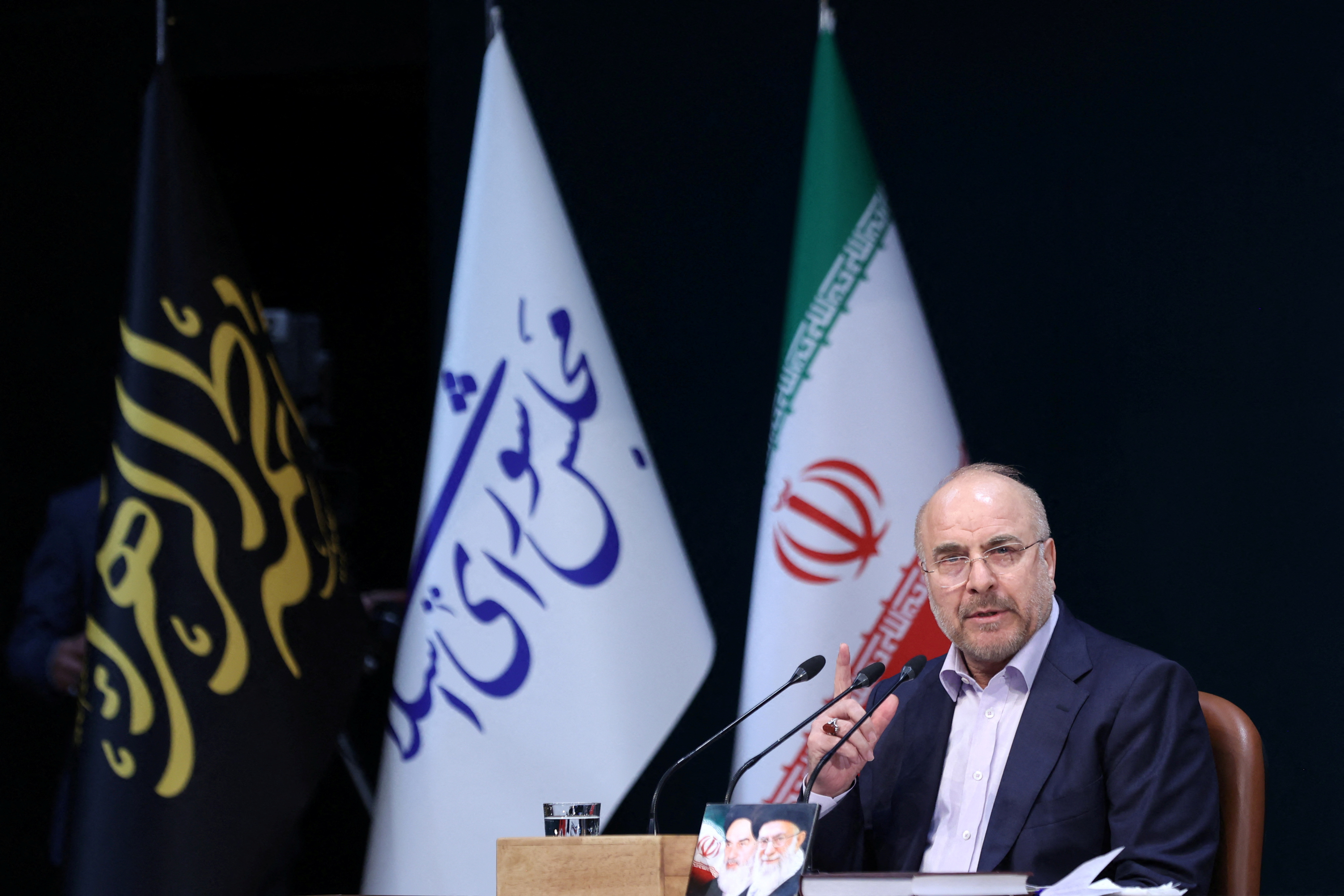 Iranian Parliament Speaker Mohammad Bagher Ghalibaf attends a press conference in Tehran