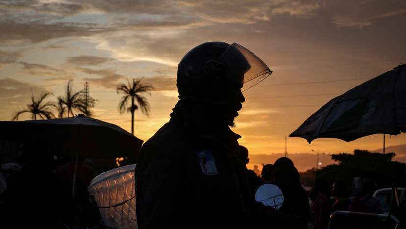 The Wider Image: Motorcycle taxi drivers of Cameroon's Douala long for jobs and escape