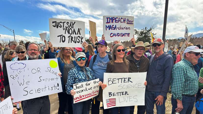 Protesters gather outside a National Oceanic and Atmospheric Administration building, to decry the Trump administration's layoffs of NOAA workers, in Boulder