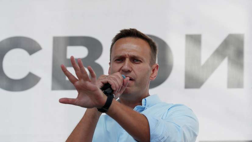 FILE PHOTO: Russian opposition leader Alexei Navalny addresses demonstrators during a rally in Moscow