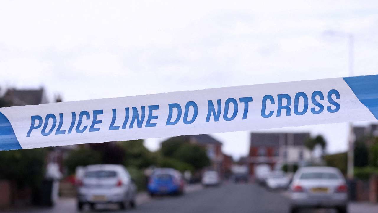 FILE PHOTO: Tributes for the victims of a knife attack in Southport