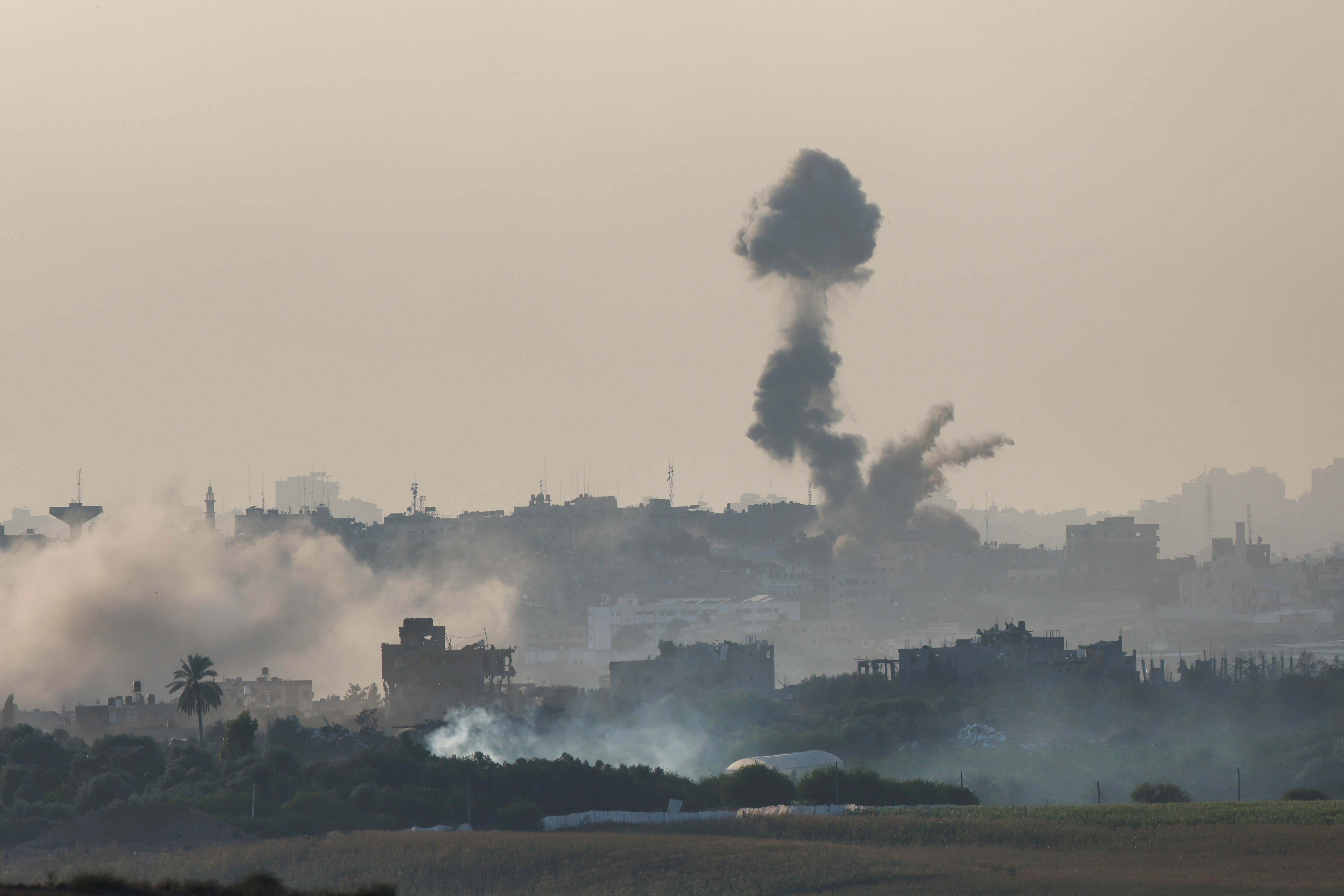 Smoke rises from an airstrike in the Gaza Strip