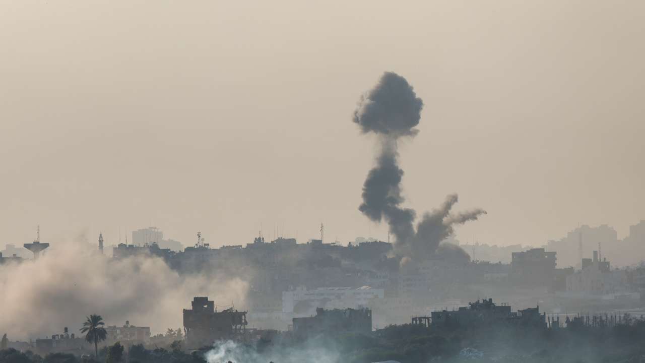 Smoke rises from an airstrike in the Gaza Strip