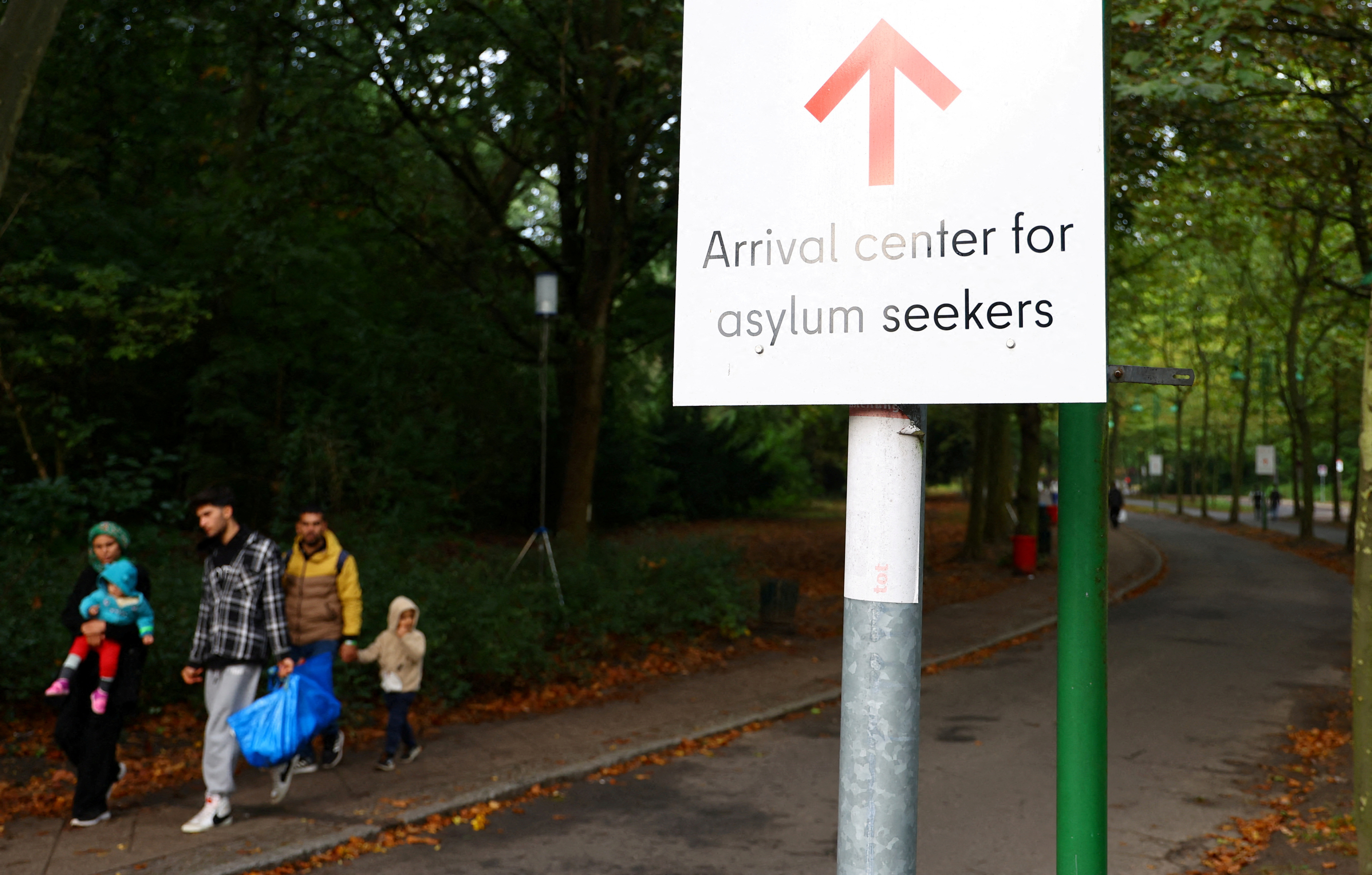 FILE PHOTO: Migrants are pictured at the arrival center for asylum seekers at Berlin's Reinickendorf district