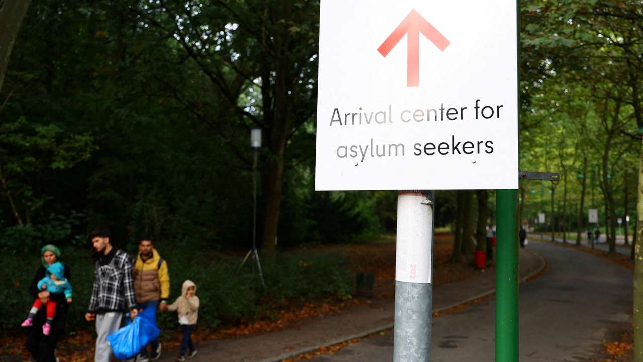 FILE PHOTO: Migrants are pictured at the arrival center for asylum seekers at Berlin's Reinickendorf district