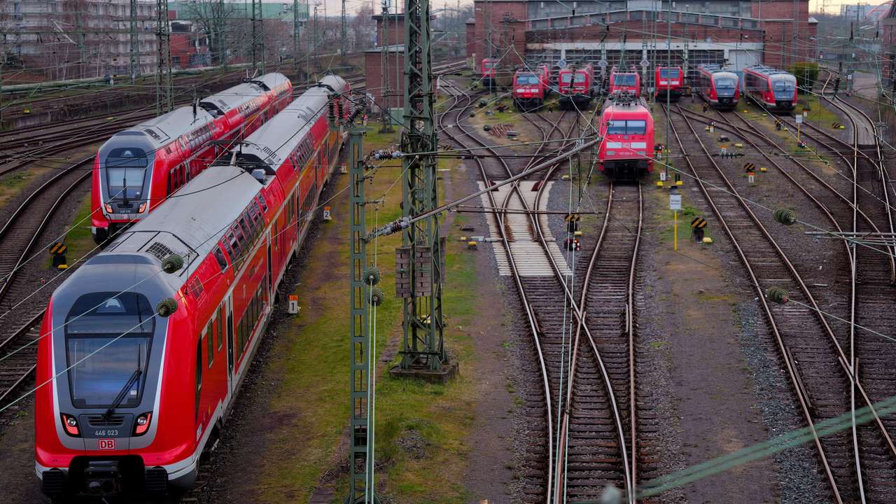 FILE PHOTO: Deutsche Bahn trains operate outside Frankfurt central station at the start of a strike by train drivers’ union GDL