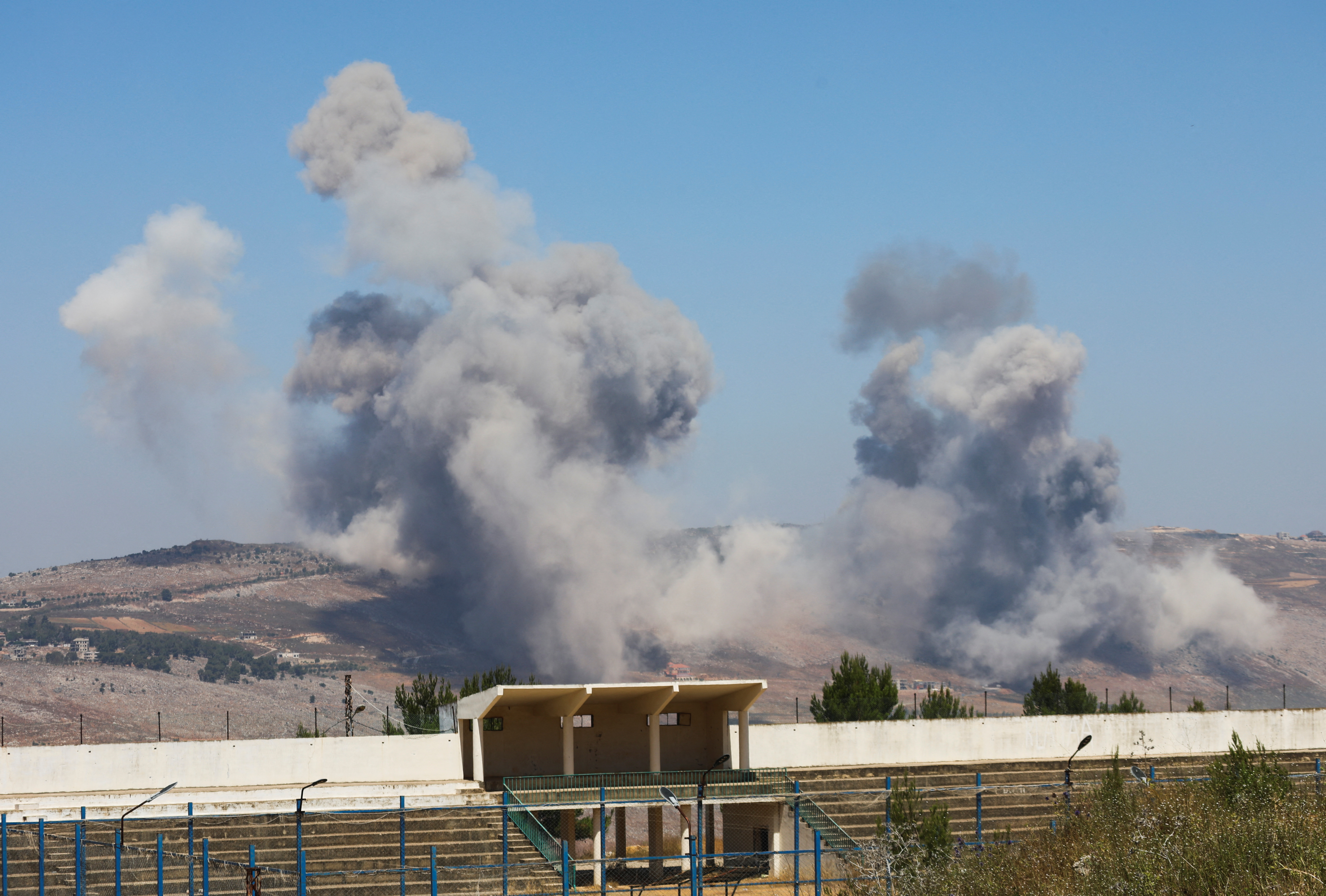 Smoke billows from the Nabatieh district, following Israeli strikes, as seen from Marjayoun