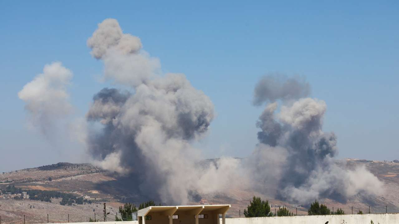 Smoke billows from the Nabatieh district, following Israeli strikes, as seen from Marjayoun